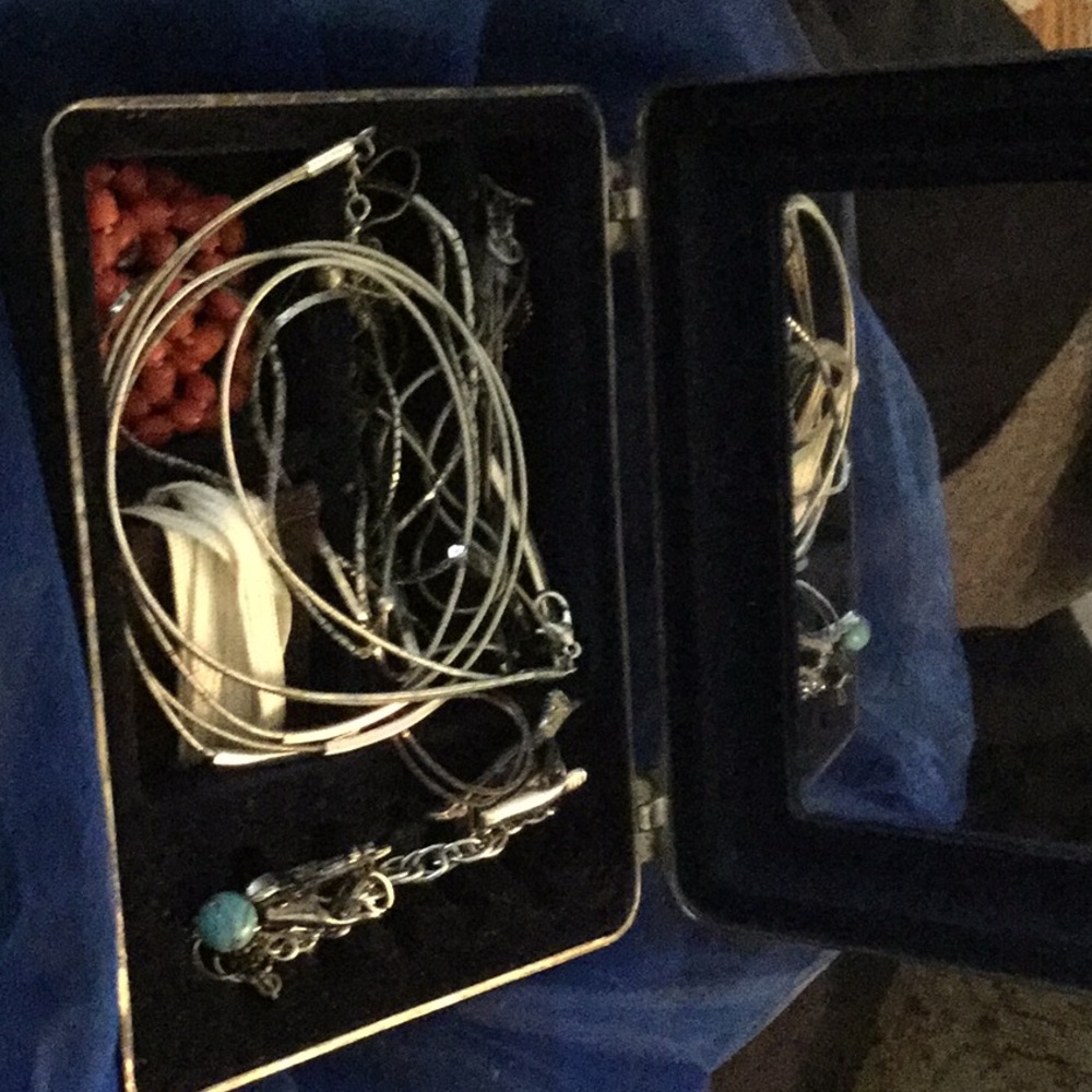 Silver jewelry in an antique silver plated box